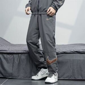 Nike Men's Dark Gray Joggers with Brown Accents